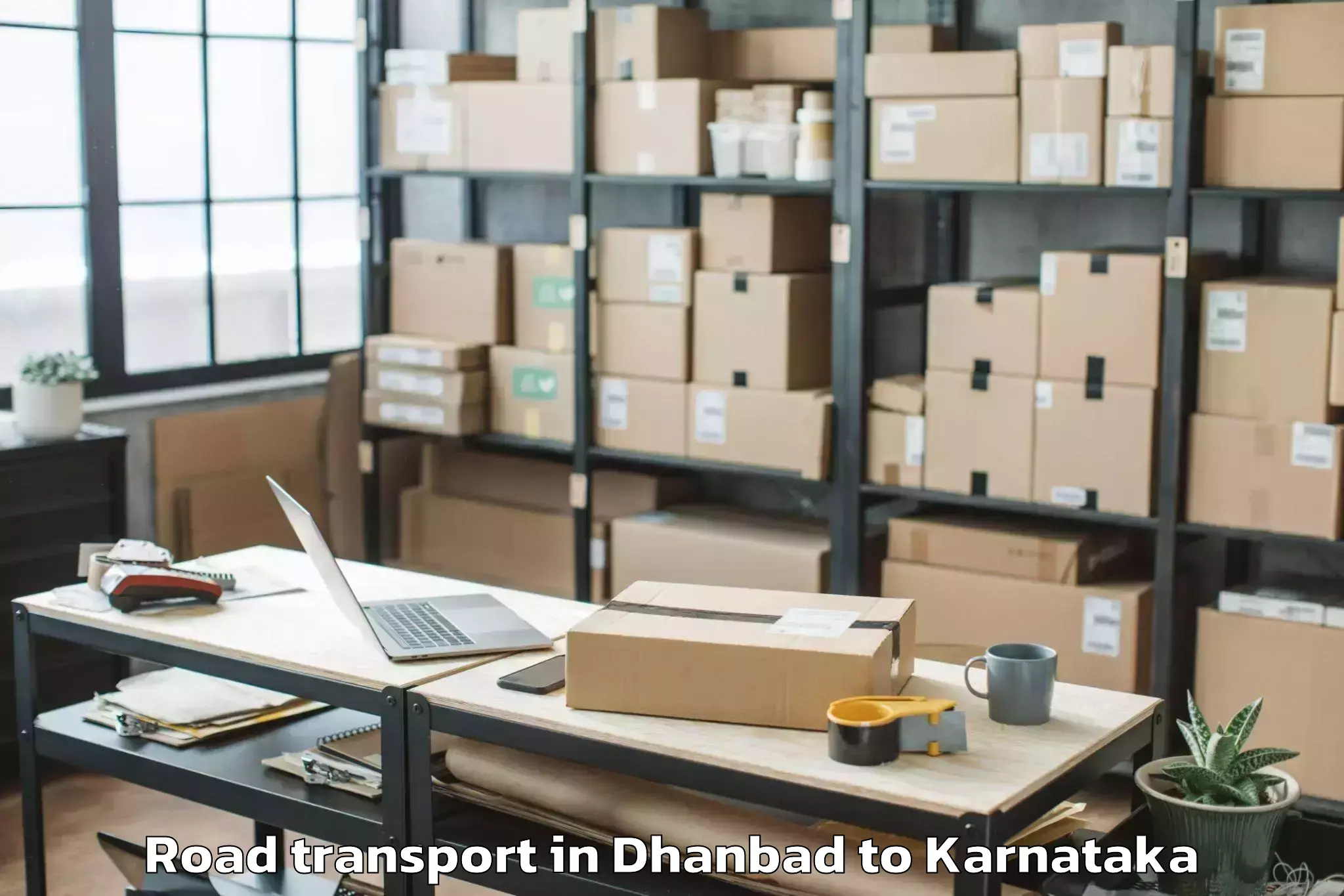 Reliable Dhanbad to Karnataka State Law University Road Transport